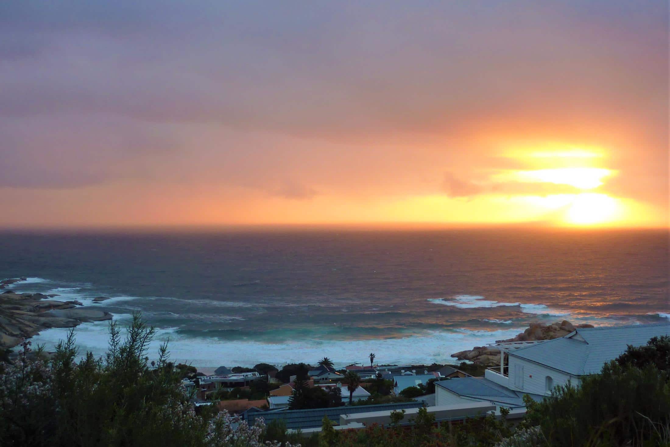 Beste reistijd Zuid-Afrika - Zonsondergang over Atlantische Oceaan bij Chapman's Peak, Kaapstad